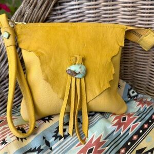 Fawn color leather bag w/turquoise stone and fringe,  this has matching lining